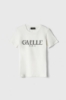 Immagine di T-Shirt Paricollo Mezza Manica Con Logo Glitter Nero • Off White