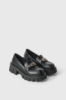 Loafer Con Suola Carro Armato E Metal Placket Su Tomaia • Nero