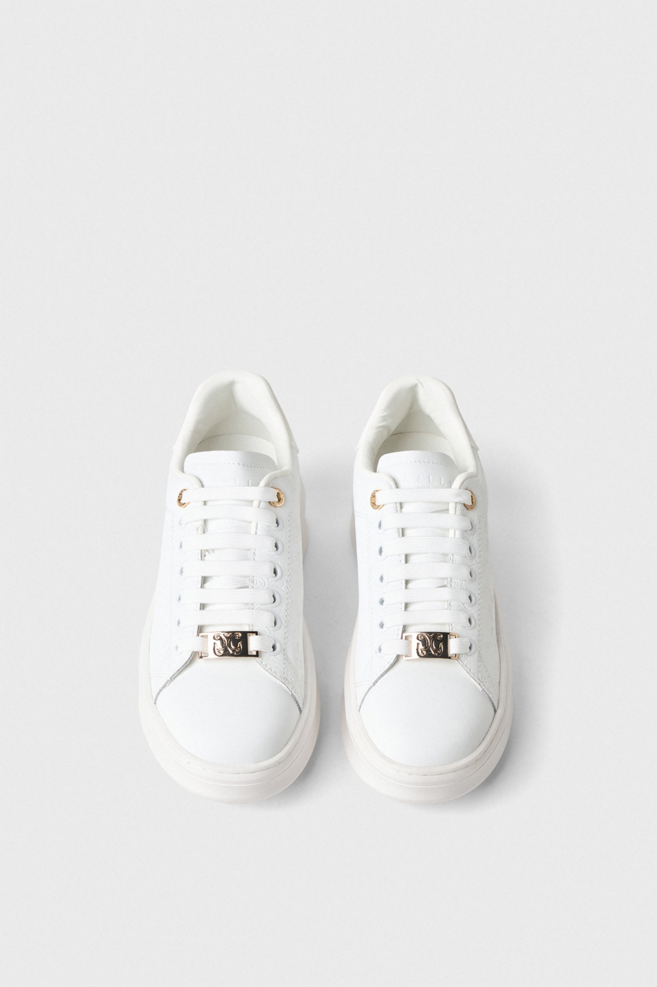 Immagine di Sneakers In Action Leather Stampata Allover Embossed Con Passalaccio Logato • Bianco