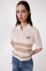 Polo In Maglia A Righe • Beige